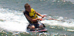 picture of boy on knee board