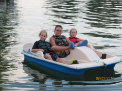 picture of kids in a paddle boat